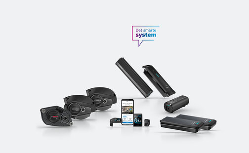 Nogle af Boschs eBike-produkter er udstillet. Over dem er der et ikon med teksten "Det smarte system".
