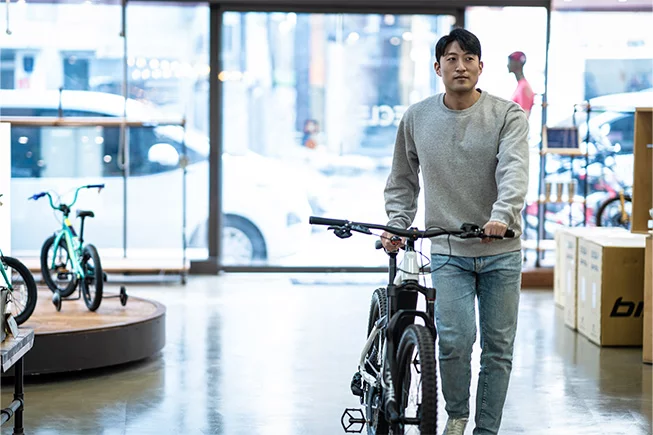 Walking into the store with eBike