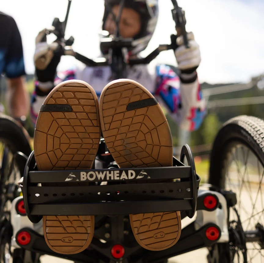 Close-up of the two rugged rear tires on Tarek Rasouli's Bowhead, an adaptive mountain bike with e-drive.