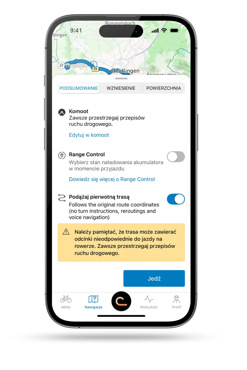 Zrzut ekranu smartfona pokazujący aktywną nawigację po trasie w aplikacja eBike Flow, z mapą, czasem przyjazdu, pozostałym dystansem, poziom naładowania w momencie przyjazdu i aktualną prędkość.