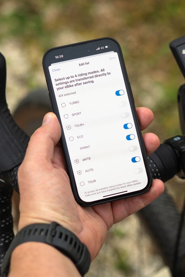 Visning af en smartphone, hvor de fire foretrukne køretilstande er valgt.