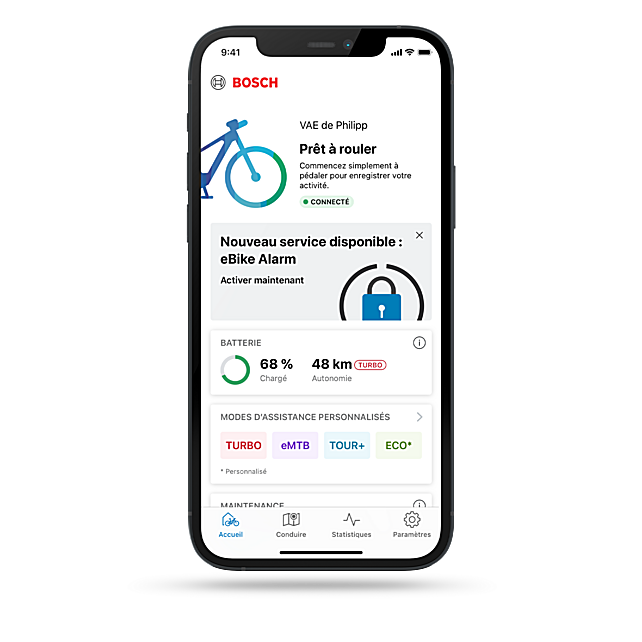 Capture d'écran de l'onglet Accueil de l'application eBike Flow qui présente le nouveau service eBike Alarm, offrant une fonctionnalité supplémentaire pour les utilisateurs de VAE.