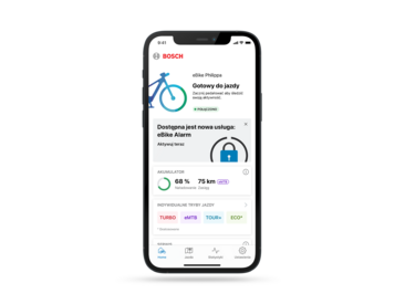 Zrzut ekranu karty głównej aplikacji eBike Flow, przedstawiający nową usługę alarmową eBike, która zapewnia dodatkową funkcję bezpieczeństwa dla użytkowników rowerów elektrycznych.