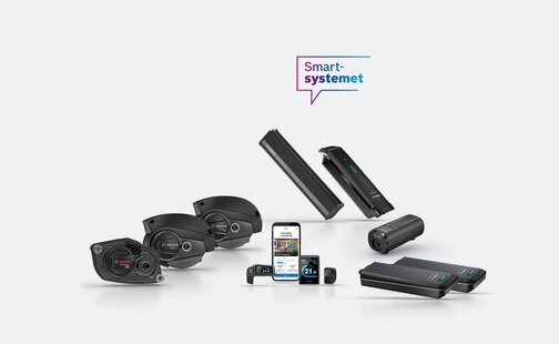 Noen av Bosch eBike-produktene er utstilt og kan ses. Over dem er det et ikon med teksten "Det smarte systemet".