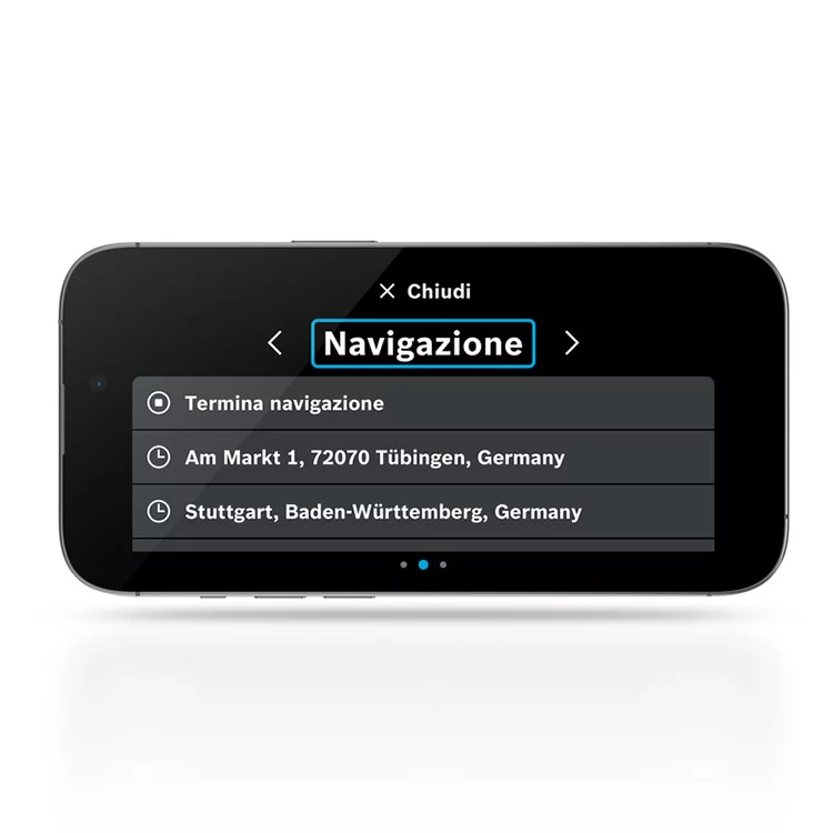 Su un telefono sdraiato e separato, viene visualizzata una schermo che visualizza il campo "navigazione". Inoltre, sono visibili l'opzione "Termina navigazione" e gli indirizzi di destinazione.
