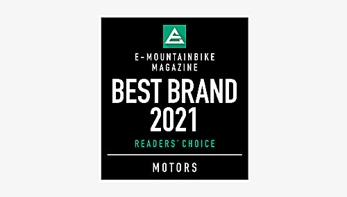 Icon with the text "E-MOUNTAINBIKE MAGAZINE BEST BRAND 2021 READERS' CHOICE MOTORS" in white and green font on a black background.