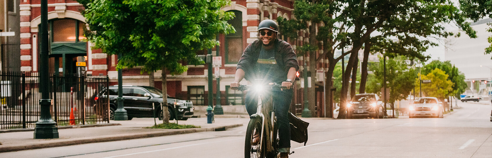 A man is seen enjoying a ride on a Bosch-equipped electric bicycle through the streets of Houston, Texas.