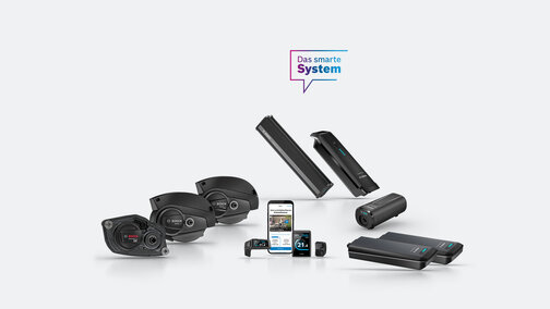 Einige Bosch eBike Produkte sind freigestellt zu sehen. Über ihnen befindet sich ein Icon mit dem Text „Das smarte System“.