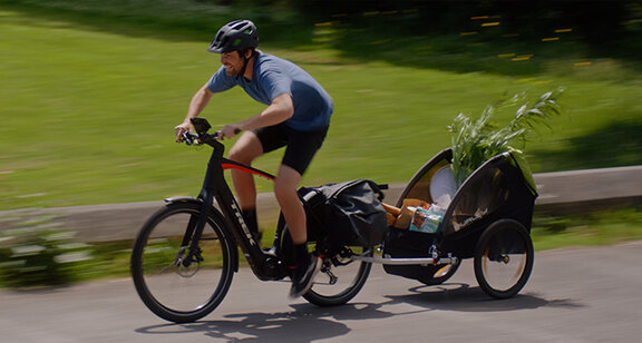 An eBiker transporting a load of groceries home.