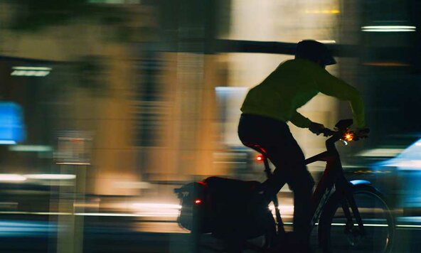 Rider on an eBike at night