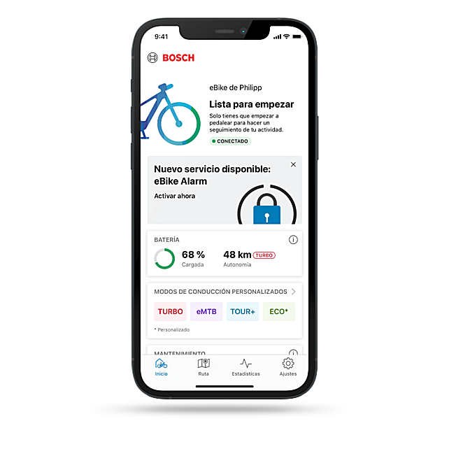 Captura de pantalla de la pestaña de inicio de la aplicación eBike Flow, que muestra el nuevo servicio eBike Alarm, que agrega una función adicional para los usuarios de eBike.