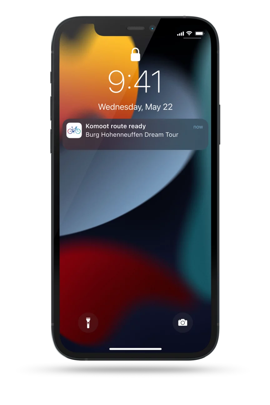 Cropped display of a phone lock screen on which a eBike Flow app notification informs you that a route is ready.