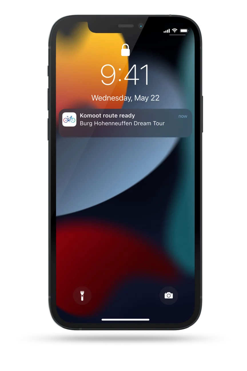 Cropped display of a phone lock screen on which a eBike Flow app notification informs you that a route is ready.