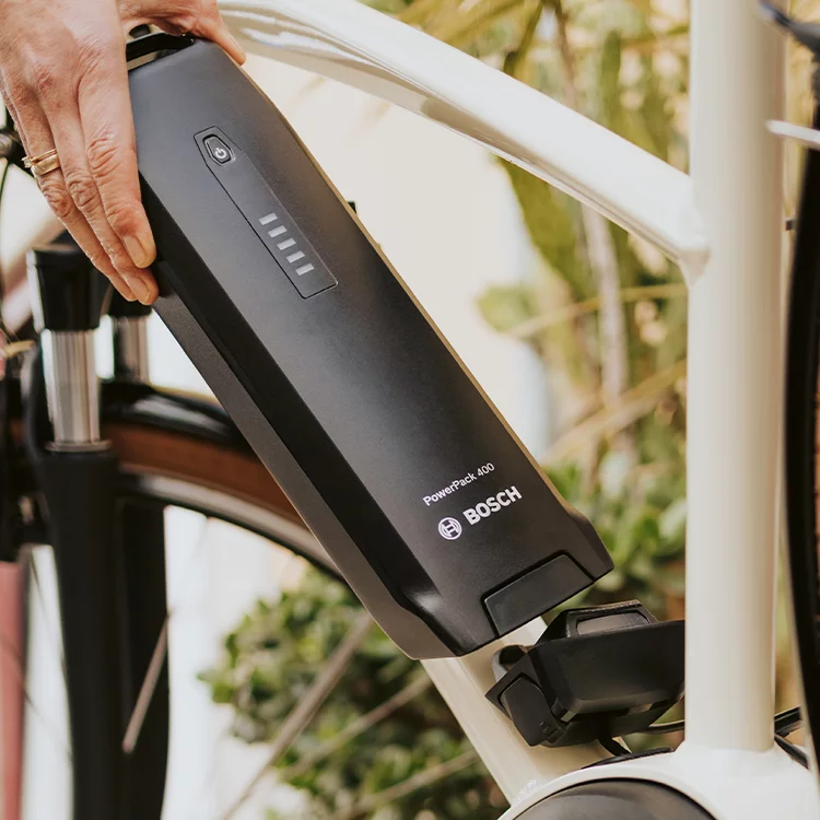 Close-up of a PowerPack 400 attached to a white eBike.