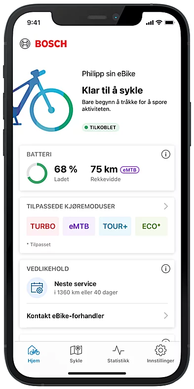 Smarttelefonen er vist med eBike Flow-appen åpen på startskjermen.