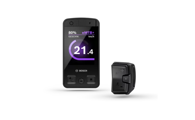 Das Display Kiox 400C und ein Mini Remote nebeneinander freigestellt vor weißem Hintergrund. Das Display zeigt die Geschwindigkeitsangabe in km/h an.