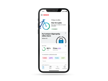 Skjermbilde av hjem-fanen i eBike Flow-appen som viser den nye eBike Alarm Service, som gir en ekstra sikkerhetsfunksjon for eBike-brukere.