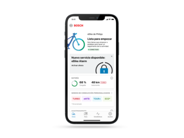 Captura de pantalla de la pestaña de inicio de la aplicación eBike Flow, que muestra el nuevo servicio eBike Alarm, que agrega una función adicional para usuarios de eBike.