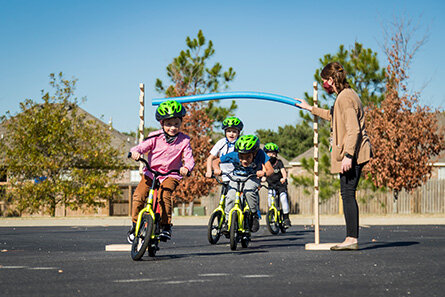 Kids showing their bike riding skills with All Kids Bike.