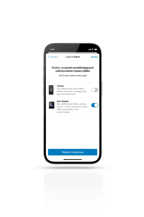Na smartfonie widoczne jest panel sterowania z funkcjami "Lock & Alarm" firmy Bosch eBike. Istnieje możliwość wyboru smartfona i/lub wyświetlacza Kiox do odblokowania roweru elektrycznego.