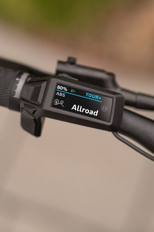 Close-up of a Purion 200 on the handlebars of an eBike with ABS Allroad screen layout.
