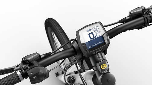 Gros plan sur un guidon de vélo où le système ABS est visible.