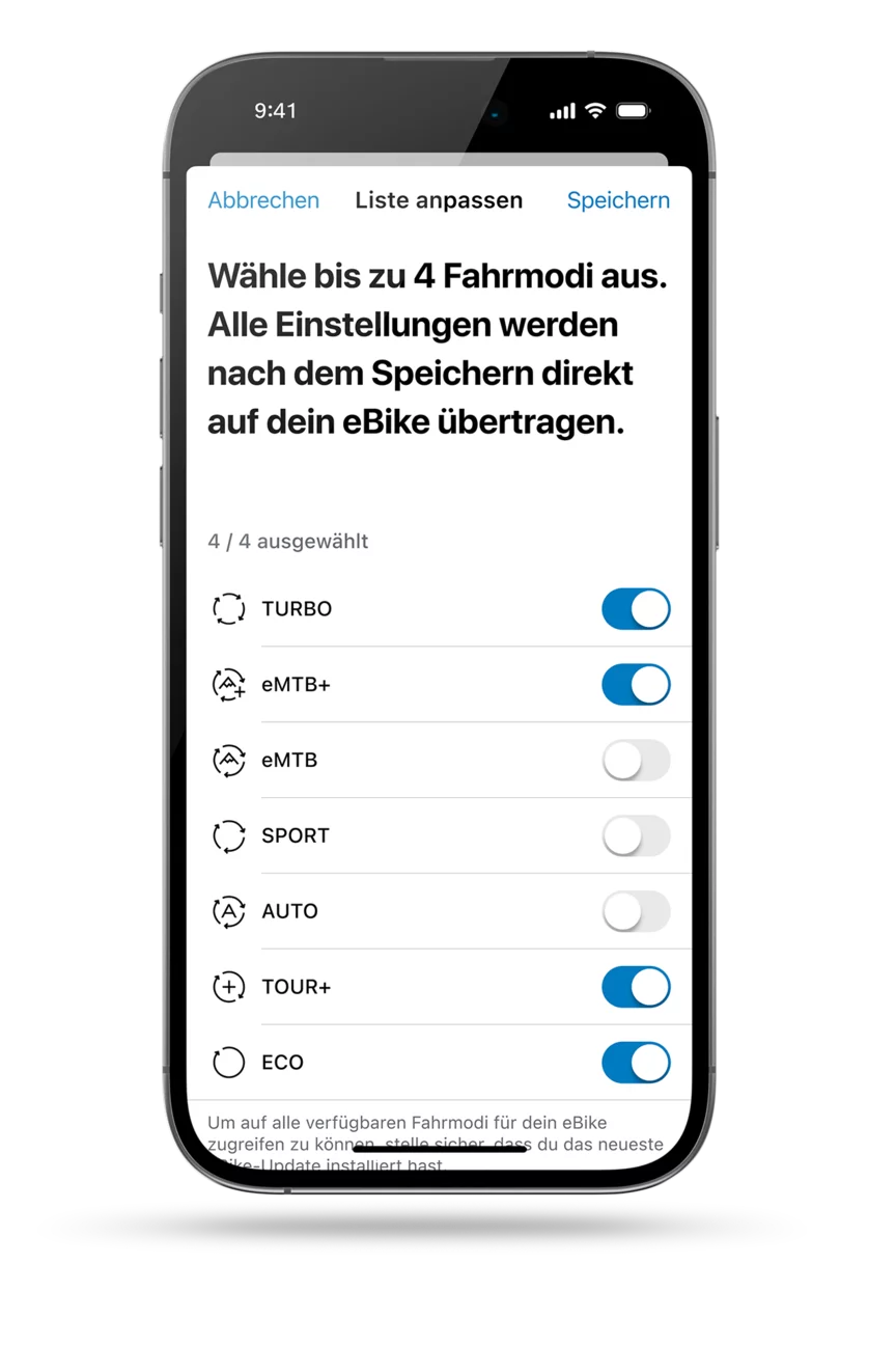 Screenshot der eBike Flow App: Liste der verfügbaren Fahrmodi (Turbo, eMTB+, eMTB, Sport, Auto, Tour+, Eco) zur individuellen Anpassung des eBikes. Maximal vier Fahrmodi sind auswählbar. Ausgwählt sind ”Turbo, eMTB+, Tour+ und Eco)
