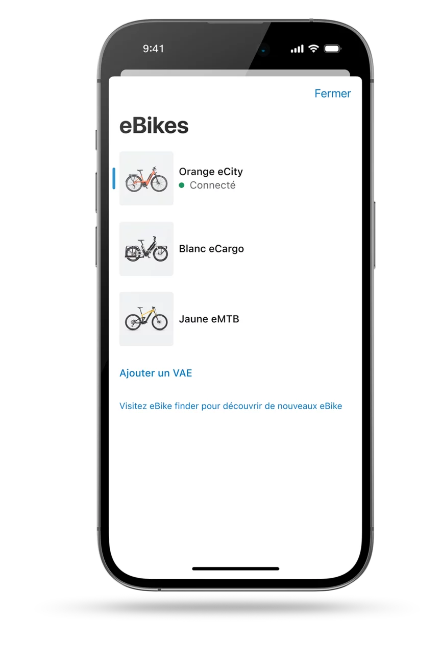 L'application eBike Flow est présentée avec un écran isolé à titre d'illustration. L'écran met en avant le garage numérique de l'application eBike Flow, qui affiche trois modèles de VAE différents.