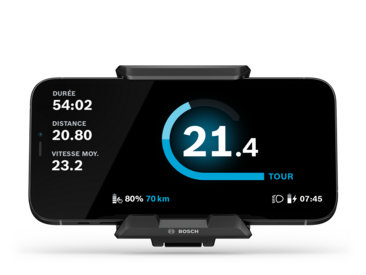 Représentation recadrée du SmartphoneGrip avec smartphone en mode Tour M sur un fond gris clair.