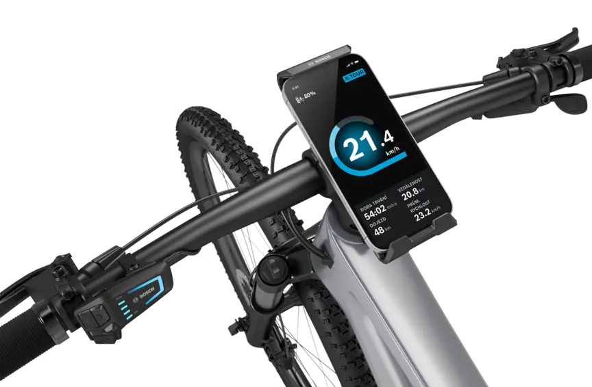 Detailní záběr řídítek eBiku, kde je uprostřed umístěn SmartphoneGrip Vertical s vloženým smartphonem.