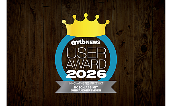 The seal of the 'emtb NEWS User Award 2026' for 'Bosch ABS with Shimano brakes'.