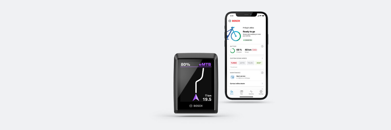 Exposed [Display] of the [Kiox 300] with open [Navigation], next to a [Smartphone] on which the [eBike Flow App] is open. Above it is a purple and blue speech bubble with 'The smart system'.