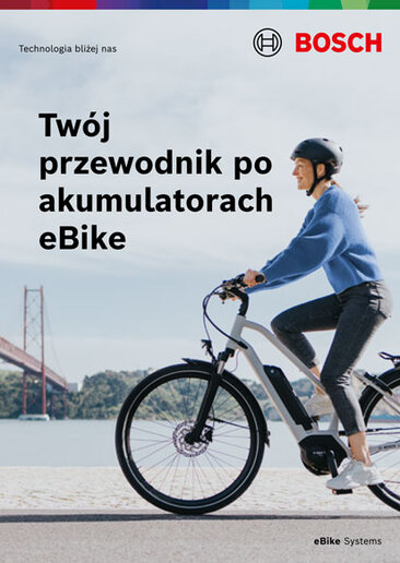 Okładka broszury produktowej z tekstem Przewodnik po akumulator eBike". W tle widoczna jest eBike-fanka podczas jazdy. W prawym dolnym rogu znajduje się napis "rower ze wspomaganiem elektrycznym / e-rower Systems".