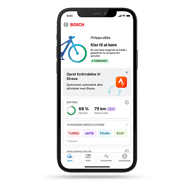 Et fritstående smartphone med åben eBike Flow-app og en anvisning til at forbinde den med Strava-appen.
