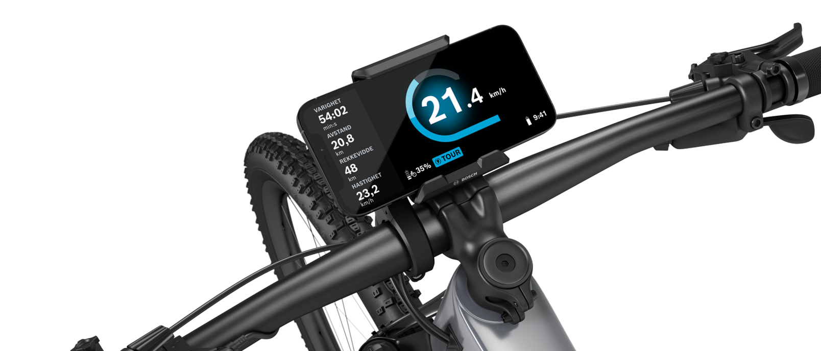 En sølvfarget elektrisk terrengsykkel med sort styre, isolert mot hvit bakgrunn. En SmartphoneGrip er montert på styret, og en smarttelefon er festet i den. Den åpne eBike Flow App viser fart i km/t, varighet i minutter, tilbakelagt distanse i kilometer, rekkevidde i kilometer og gjennomsnittshastighet. I tillegg vises batteristatus og kjøremodus.