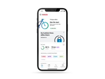 Skärmdump av startsidan i eBike Flow-appen som visar den nya eBike Alarm Service, vilken erbjuder en extra säkerhetsfunktion för eBike-användare.