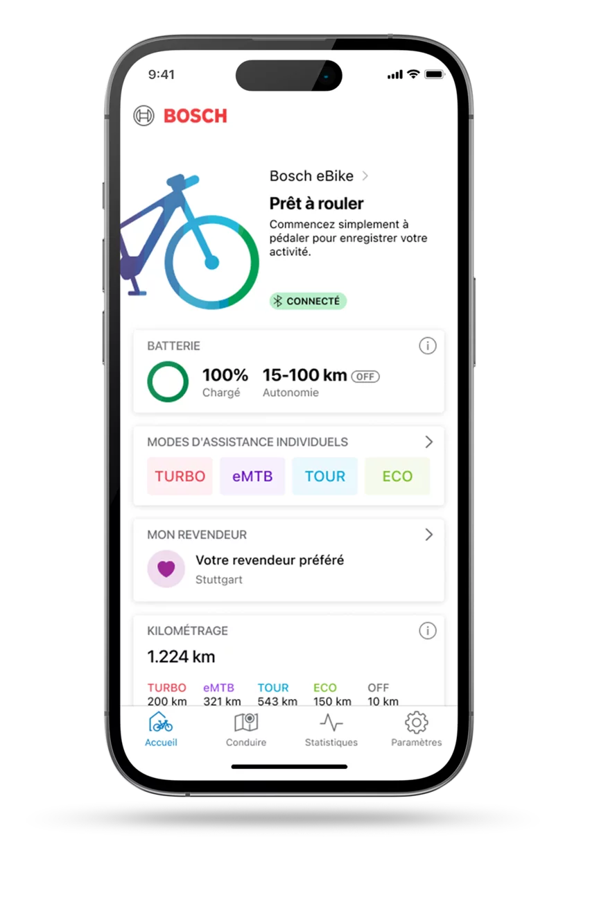 Smartphone recadré avec la page d’accueil de l’application eBike Flow ouverte.