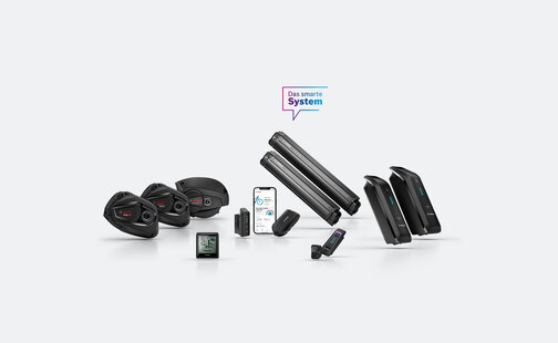 The new eBike product models (Drive Units, Remotes, Displays, and Batteries) with the text 'The Smart System' above them.