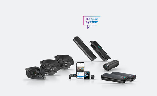 Some Bosch eBike products can be seen cropped. Above them is an icon with the text "The smart system".